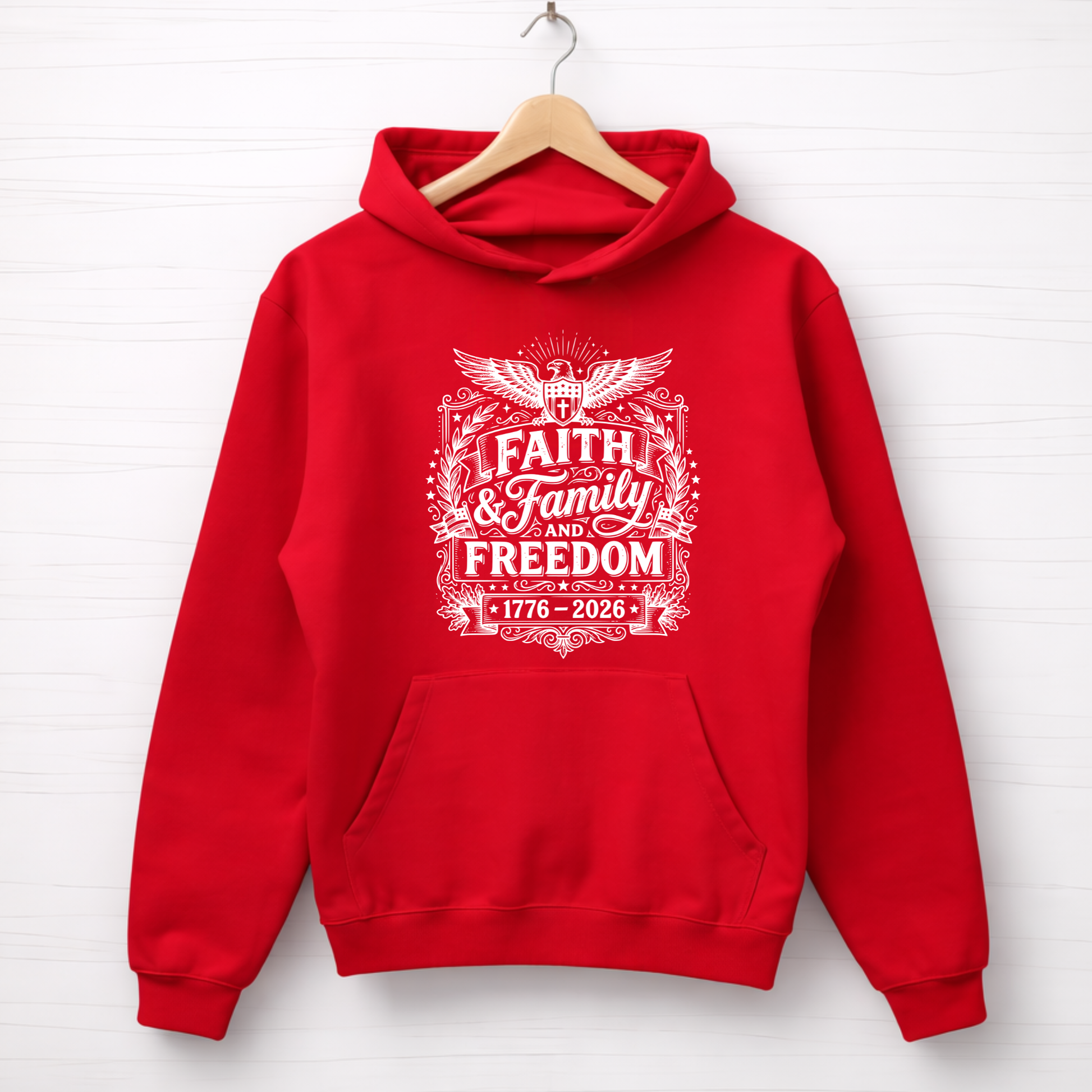Red hoodie with 'Faith & Family Freedom' text on a white background