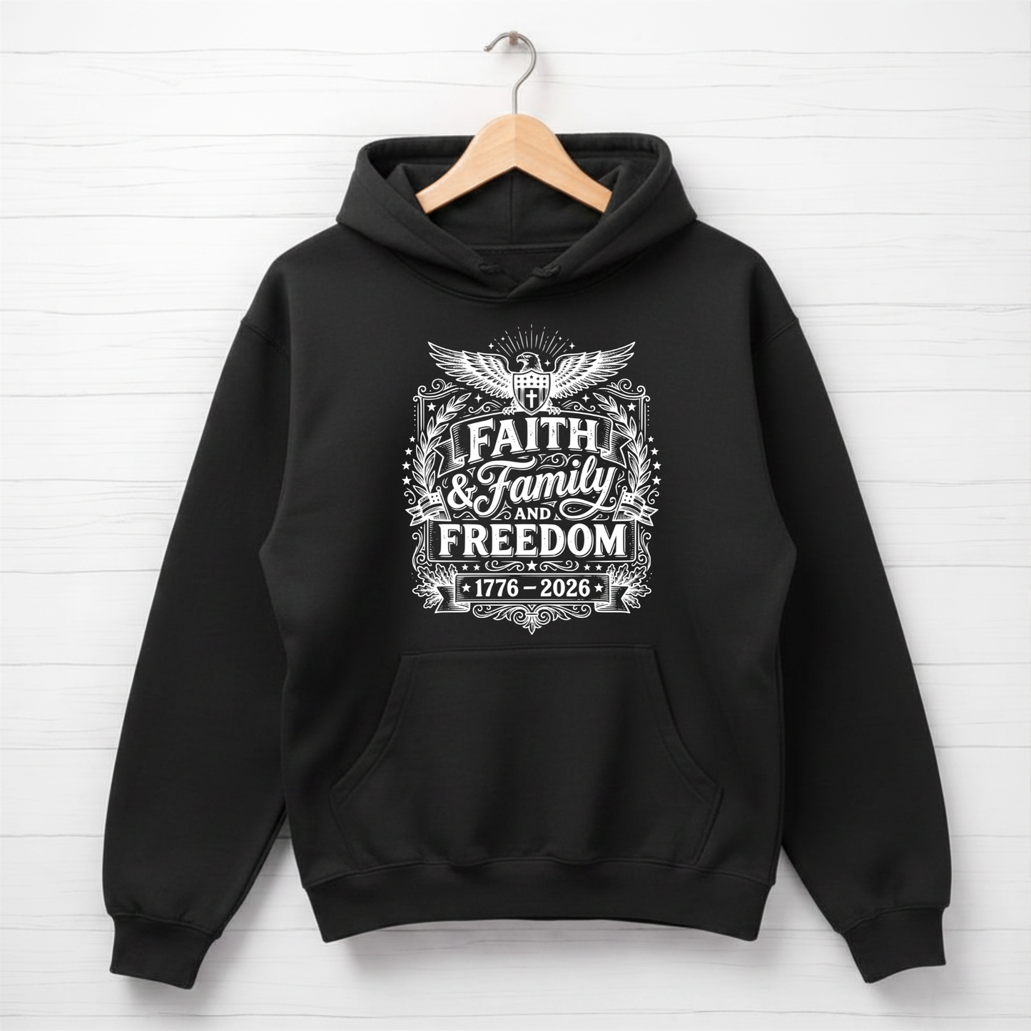 Black hoodie with 'Faith & Family Freedom' text on a white background