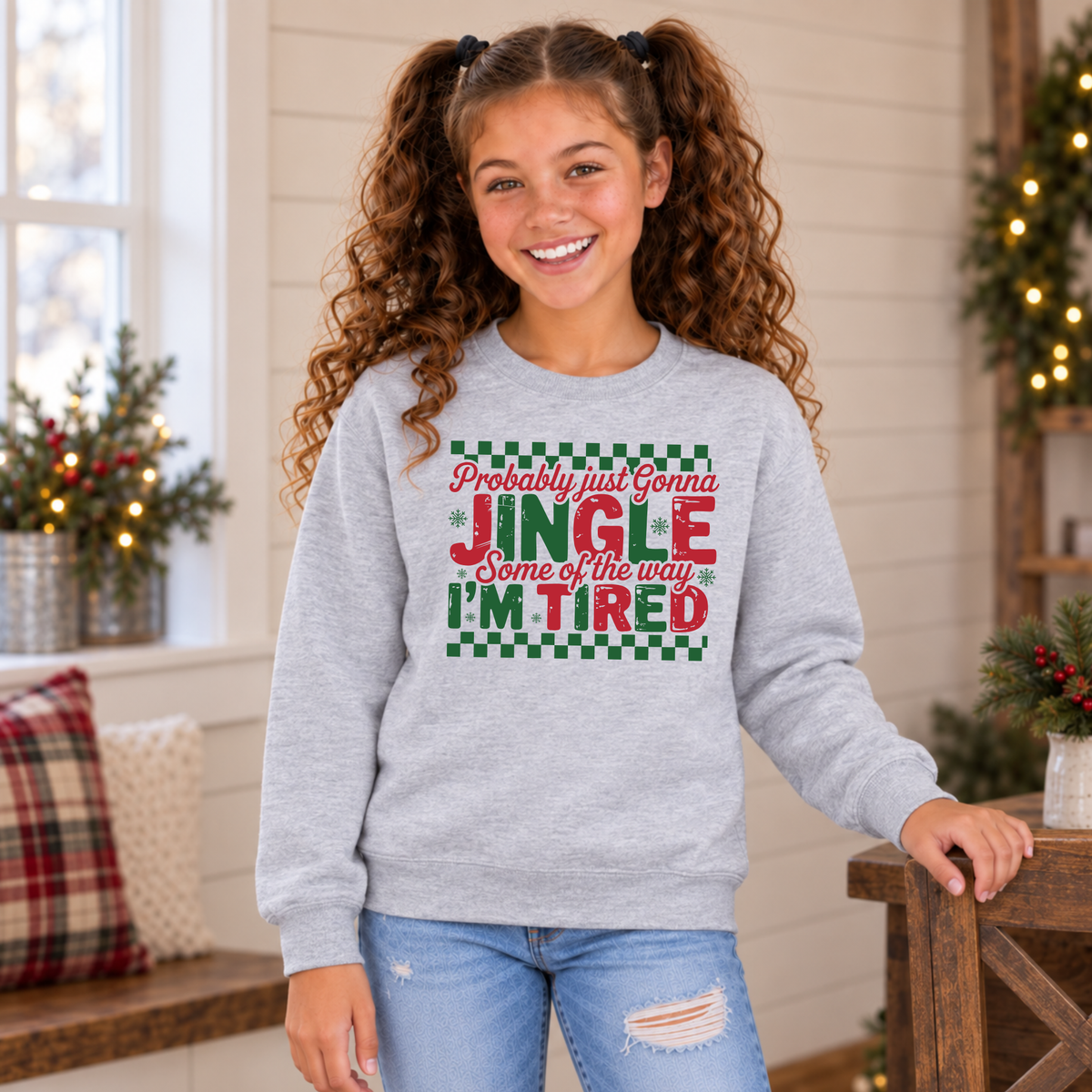 Girl wearing a sport gray youth sweatshirt with red and green Probably Just Gonna Jingle Some of the Way I'm Tired Christmas design