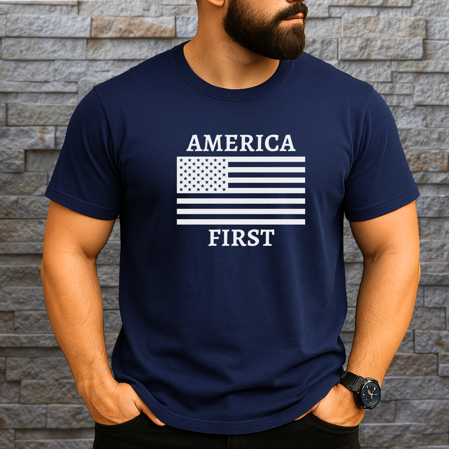 Muscular man in navy blue America First t-shirt with white flag design standing against stone wall