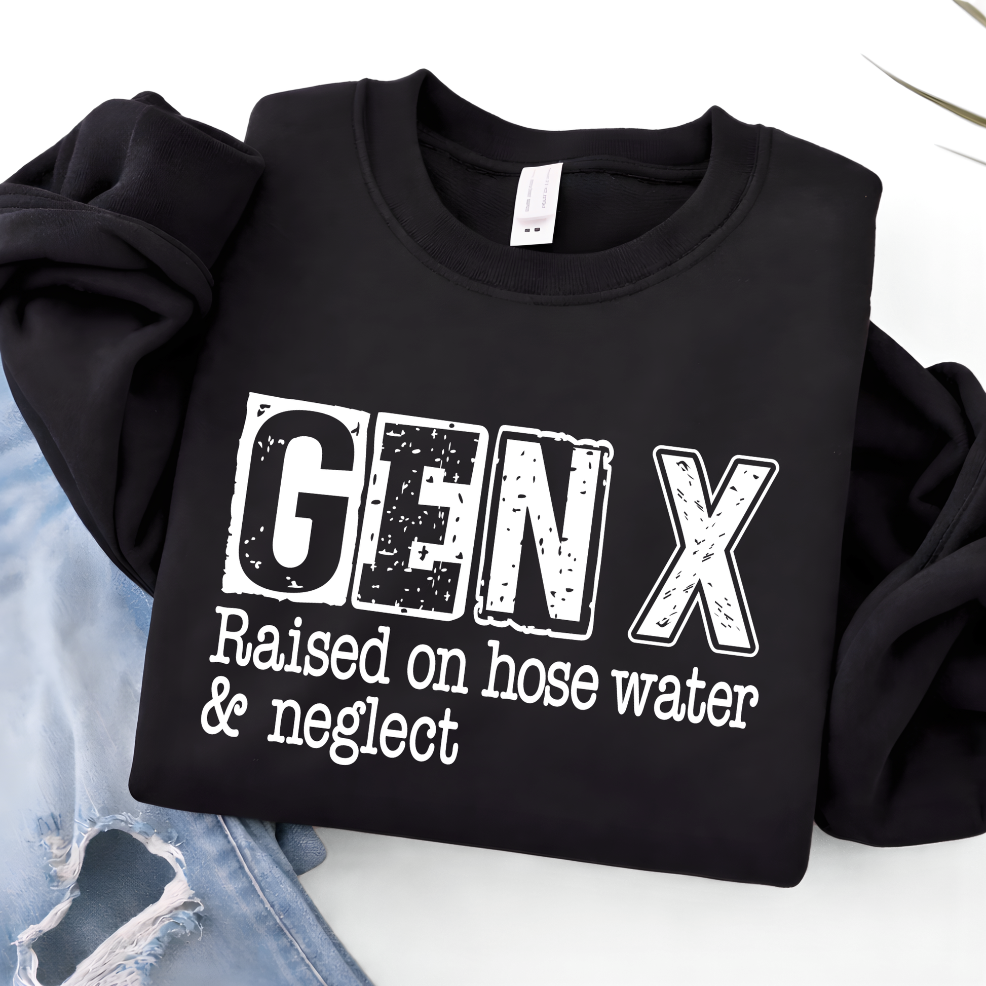 Black sweatshirt with 'GEN X Raised on hose water & neglect' text on a white background