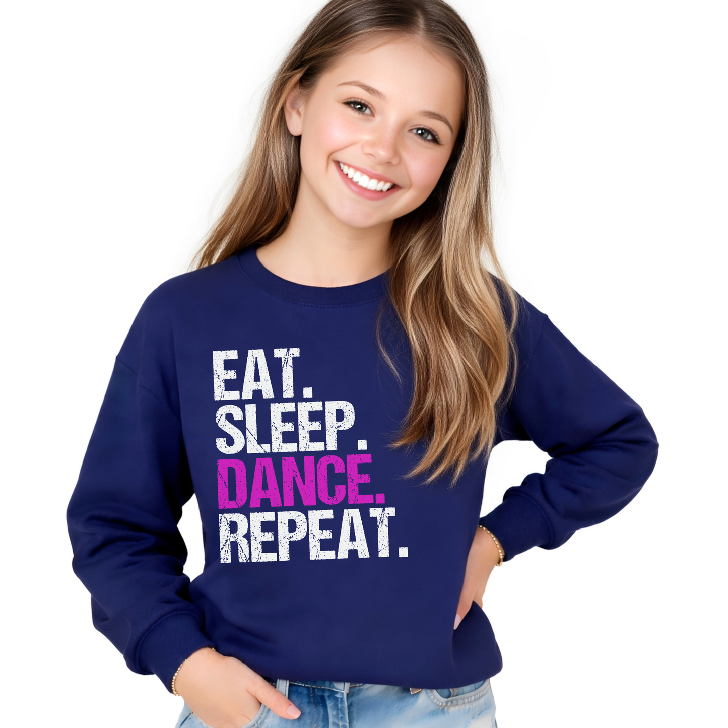 Young girl wearing a navy blue sweatshirt with 'EAT. SLEEP. DANCE. REPEAT.' text on a white background