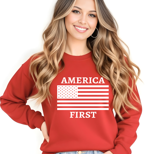 Woman wearing a red sweatshirt with 'AMERICA FIRST' and an American flag design on a white background