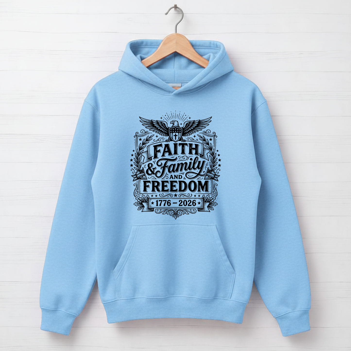 light blue hoodie with 'Faith & Family Freedom' text on a white background