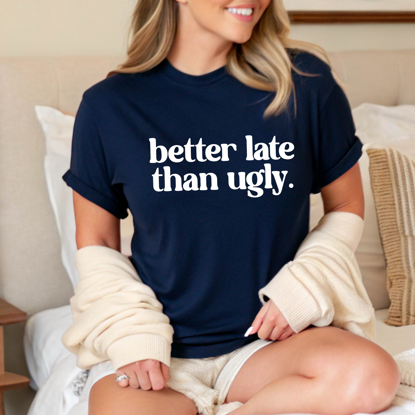 Woman lounging in navy tee – comfy and sassy graphic shirt

