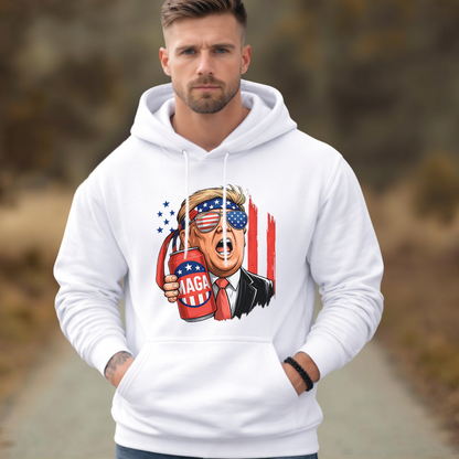 Man wearing a white hoodie with a graphic design of a political figure holding a can, set against a blurred natural background.