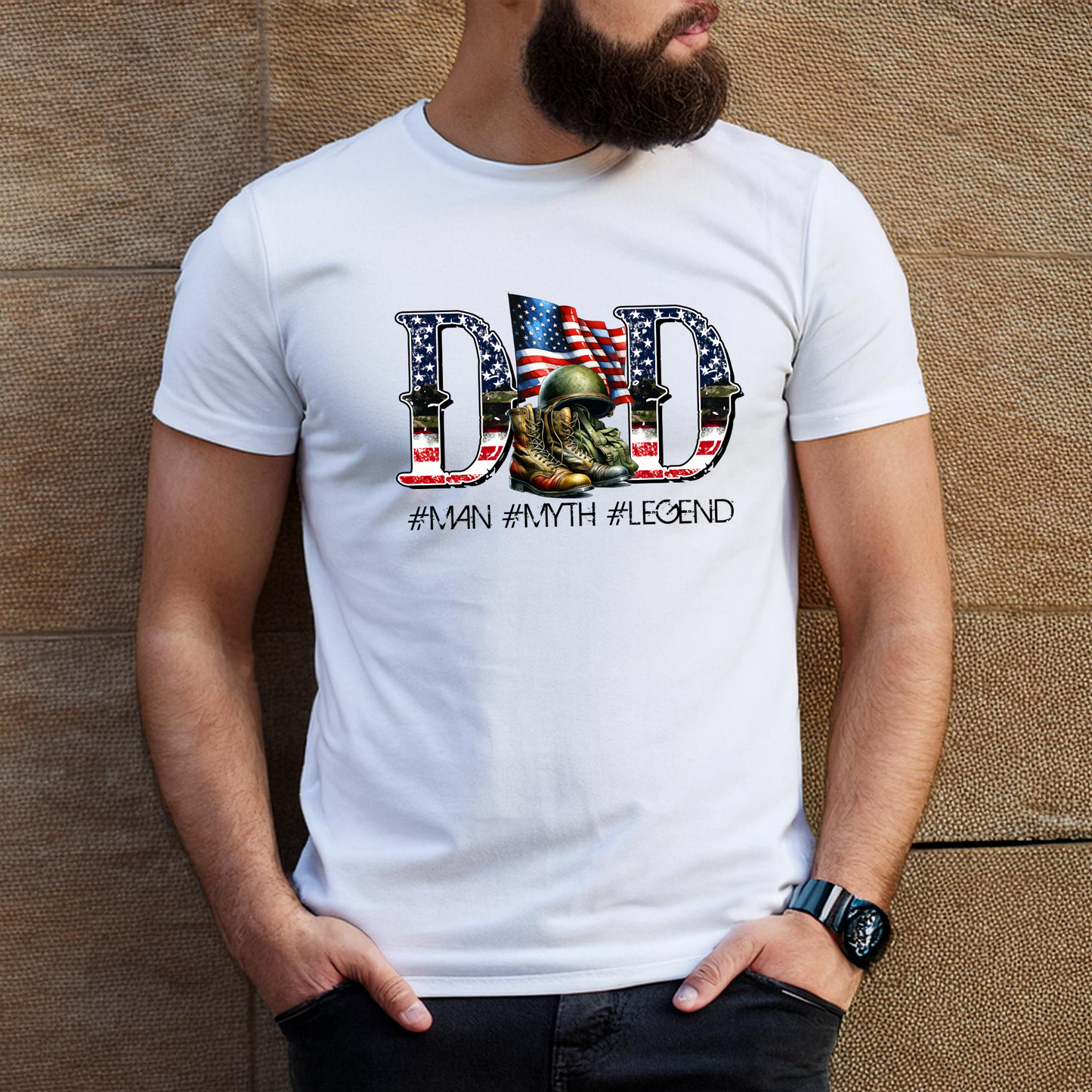 White shirt featuring DAD with flag fill and helmet/boots graphic – tribute to military fathers

