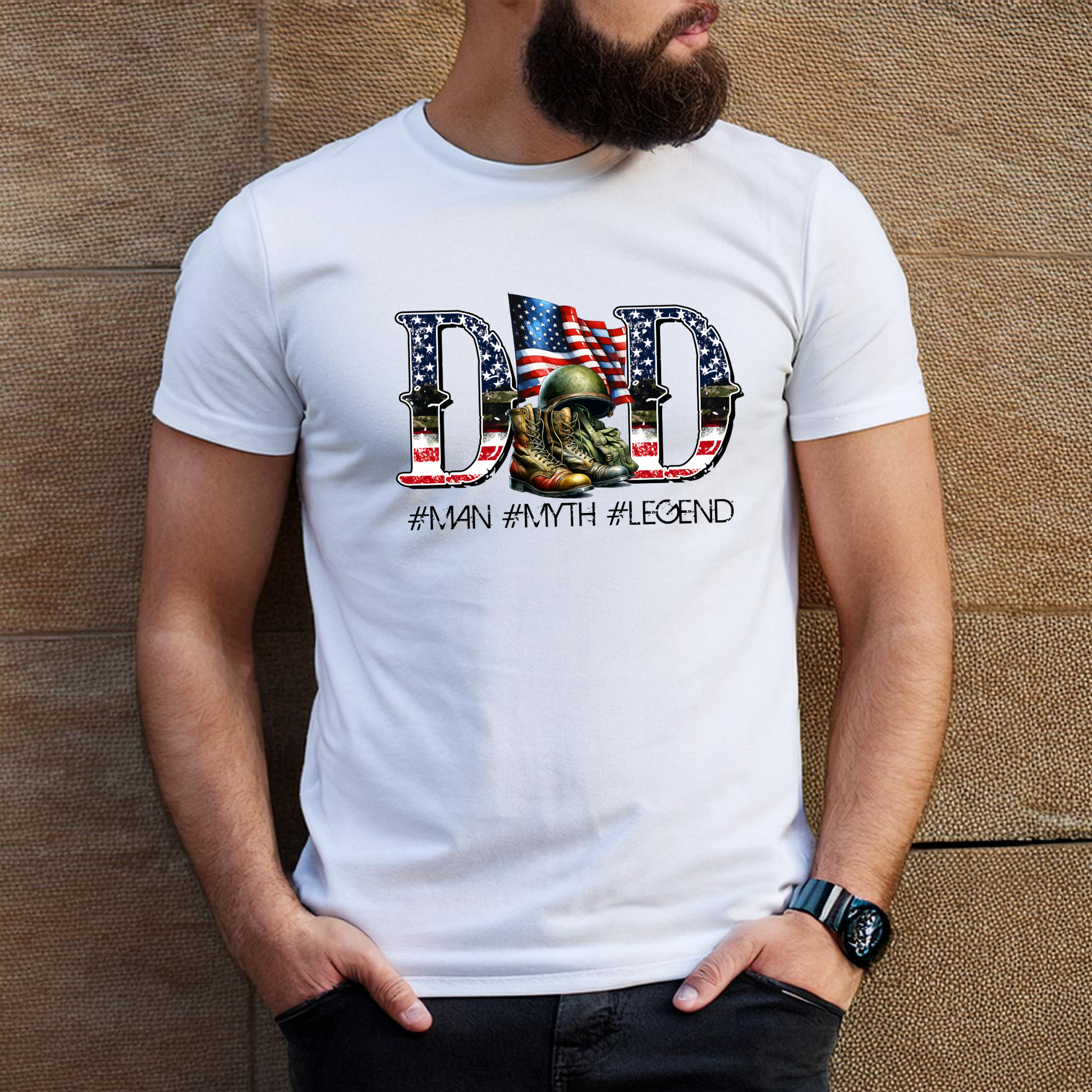 White shirt featuring DAD with flag fill and helmet/boots graphic – tribute to military fathers

