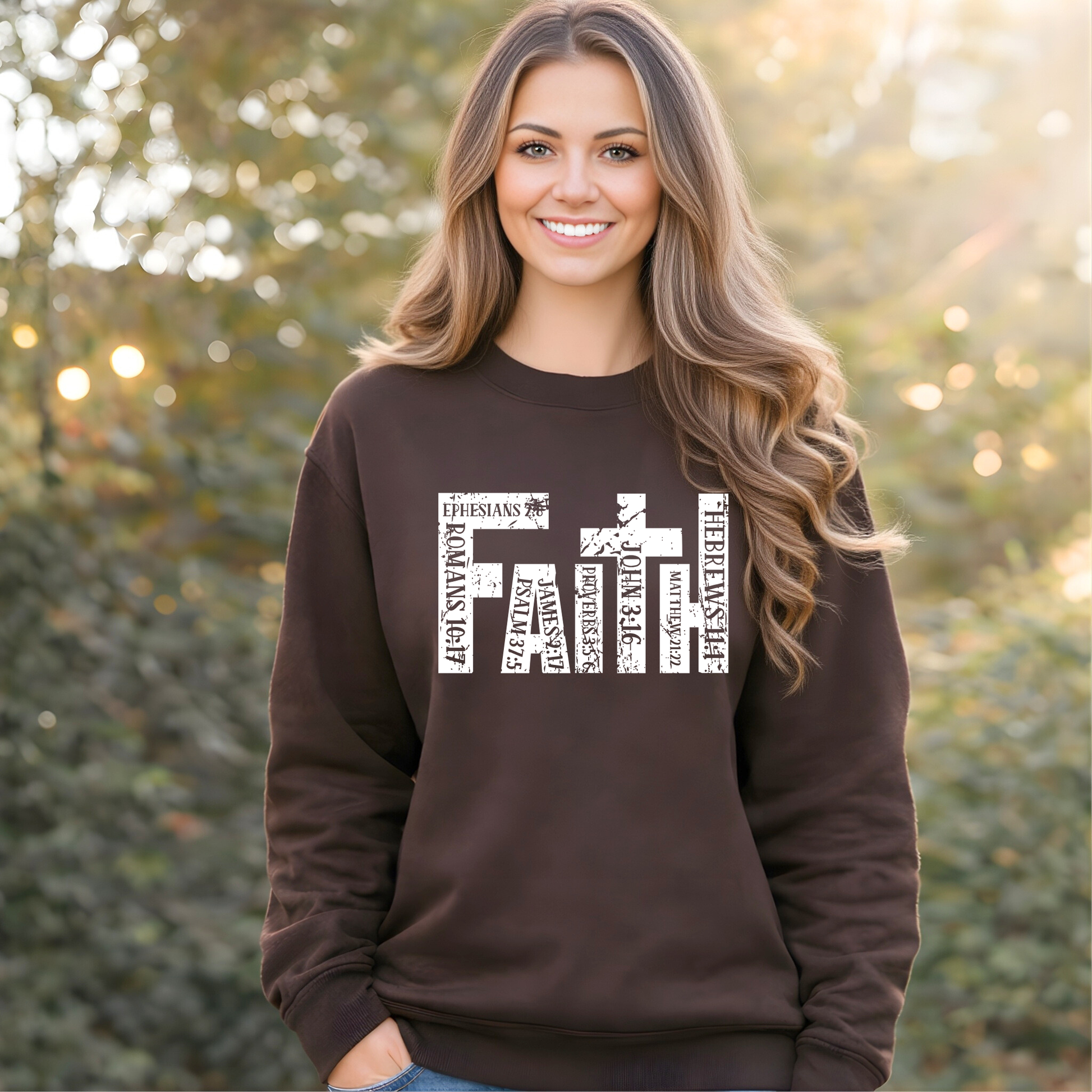 Woman wearing brown unisex Christian sweatshirt featuring faith cross scripture design