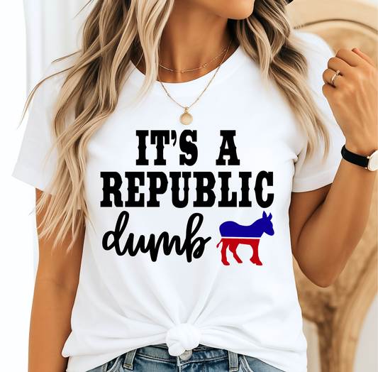 White shirt with "It’s a Republic Dumb" design worn by woman