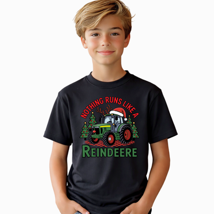 Child wearing a black t-shirt with a Country Christmas-themed design featuring a tractor and reindeer.