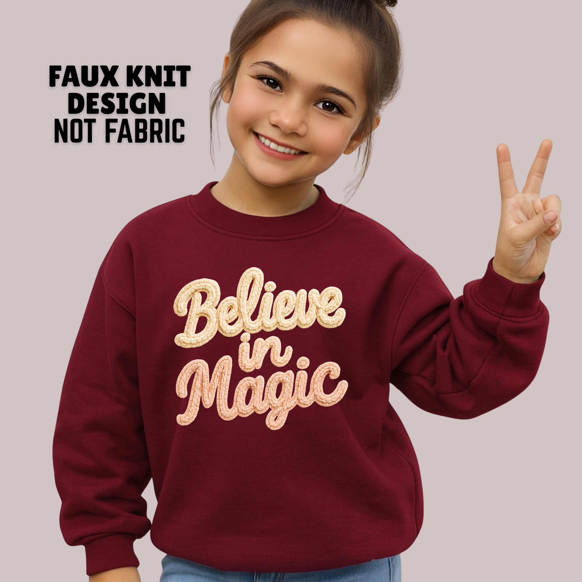 Youth girl wearing maroon faux knit Believe in Magic holiday sweatshirt