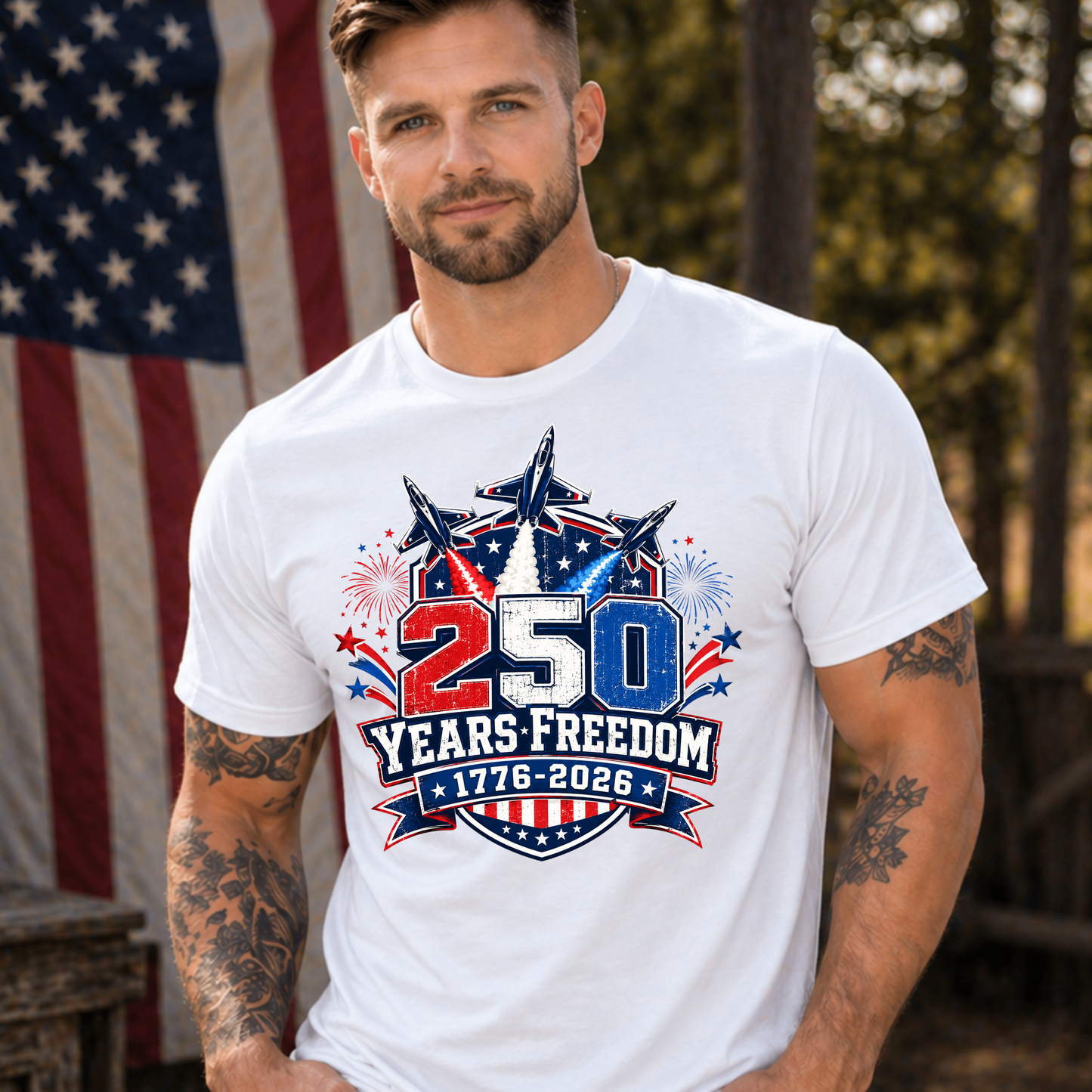 Man wearing a white t-shirt with a 250 Years Freedom design in front of an American flag.