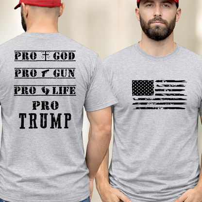 Two men wearing gray t-shirts with political text and an American flag design.
