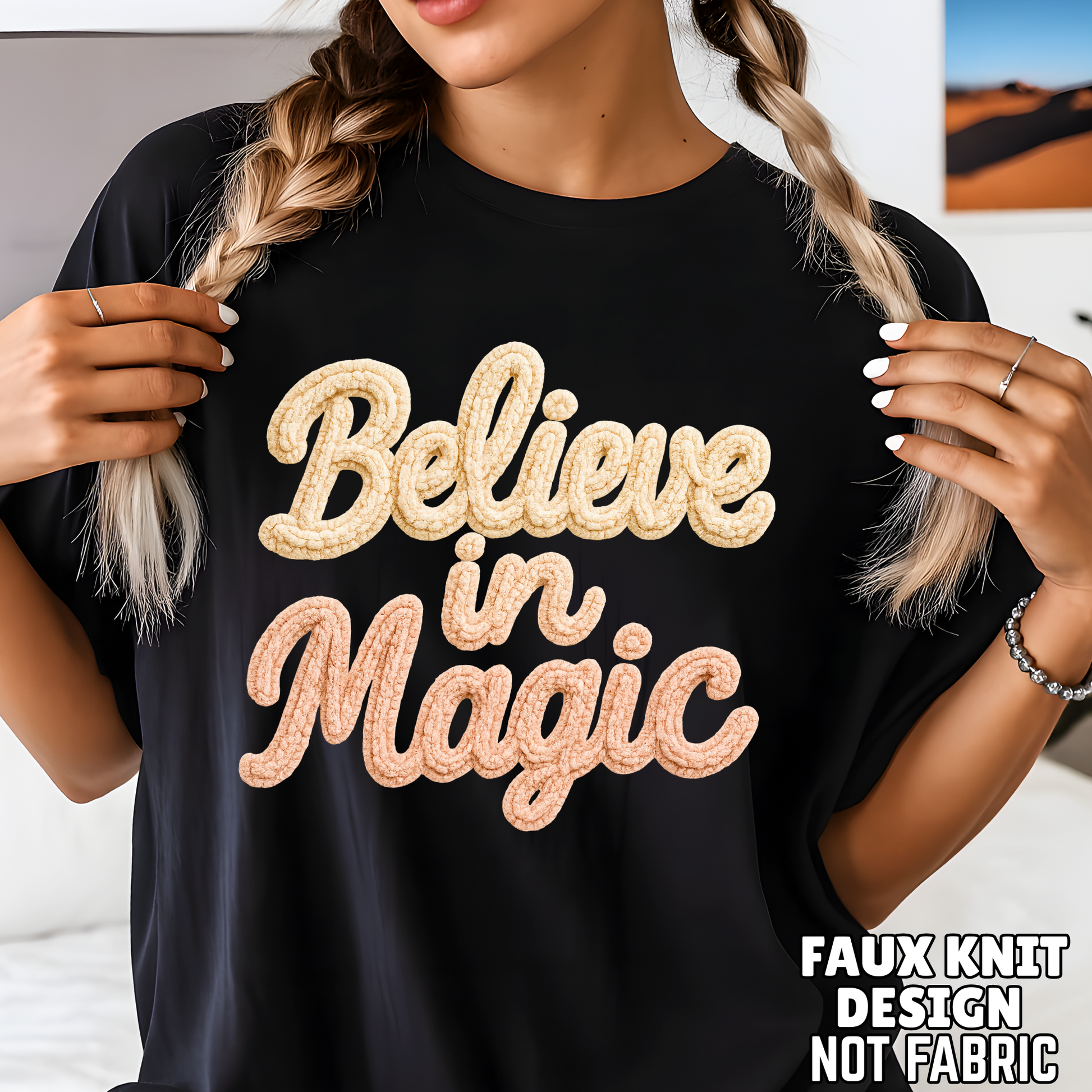 Black oversized tee with Believe in Magic faux knit print shown on model