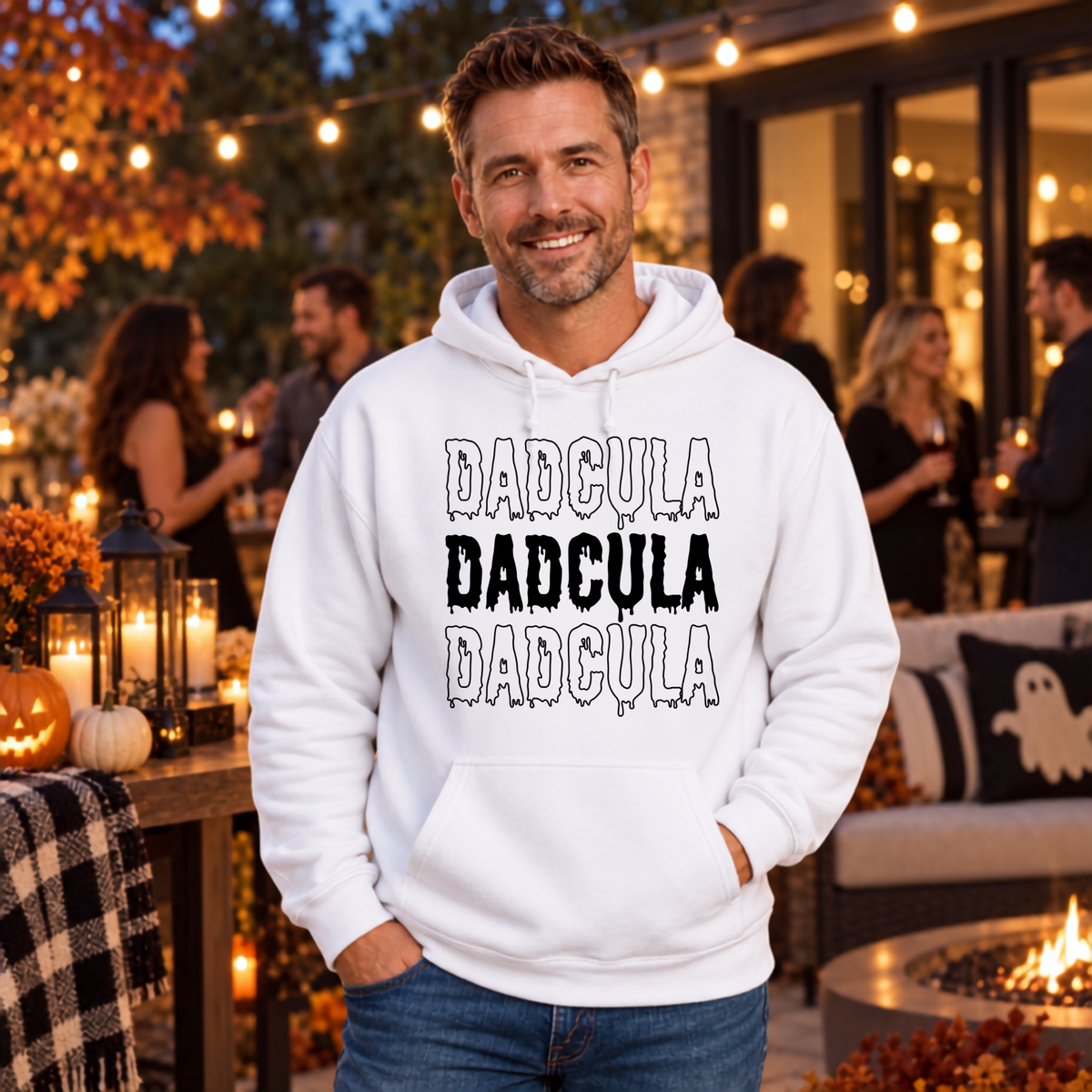 Man modeling a DADCULA Halloween graphic top with a playful vampire dad theme.