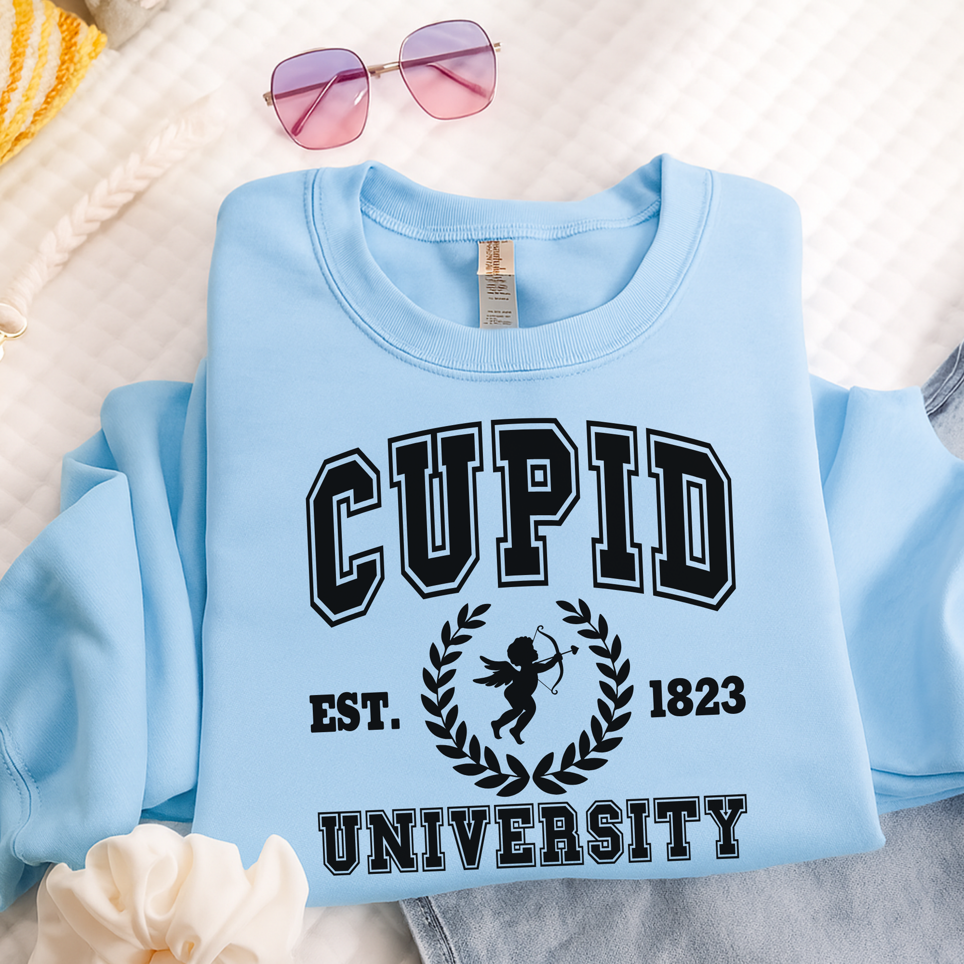 Close-up of crewneck collar stitching on Cupid University sweatshirt