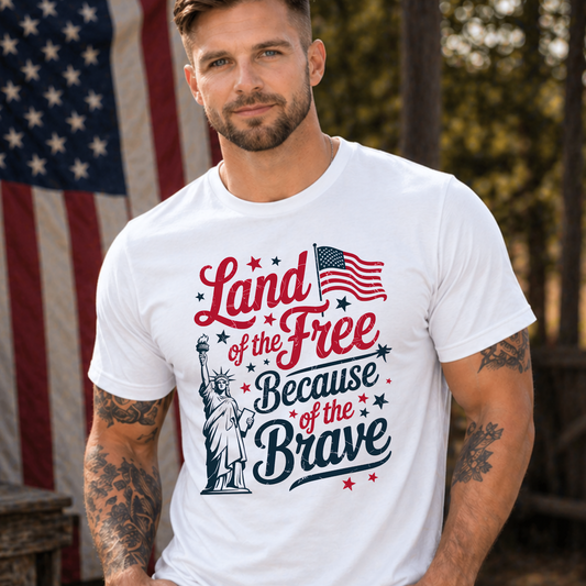 Man wearing a white t-shirt with a patriotic design in front of an American flag.