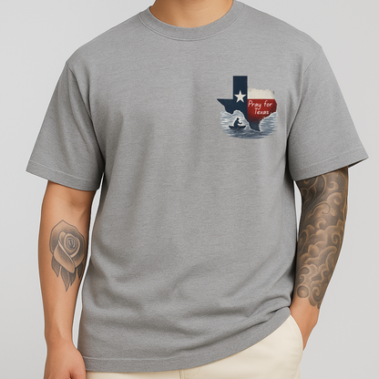 Man wearing gray Pray for Texas shirt featuring Texas state shape, floodwaters, and a silhouette in prayer. Front design only.