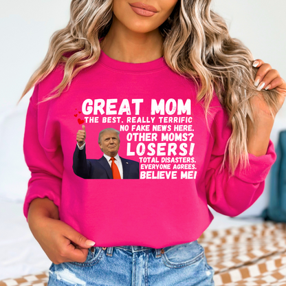 Show your mom she’s the best with this hilarious Great Mom Trump Sweatshirt! Featuring bold text and an iconic thumbs-up image, this design plays on a famous speech style, making it a funny, patriotic, and conservative-friendly gift for Mother’s Day, birthdays, or just because.