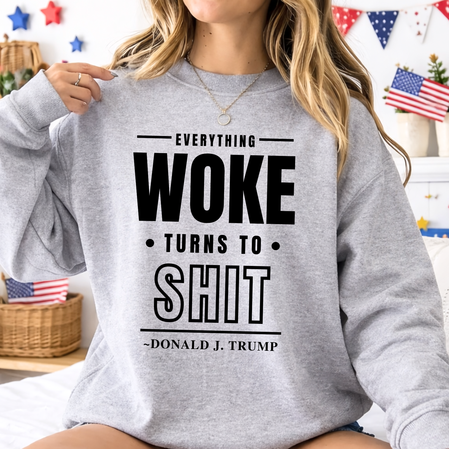 Woman wearing sports gray crewneck sweatshirt with bold quote graphic in patriotic setting – The Right Side Prints

