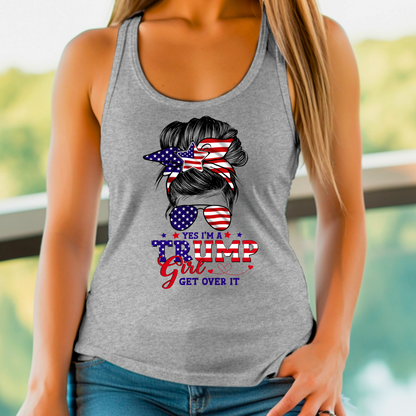 A woman wearing a Gray tank top with a graphic design that includes the American flag and text 