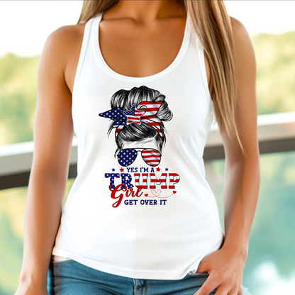 A woman wearing a white tank top with a graphic design that includes the American flag and text