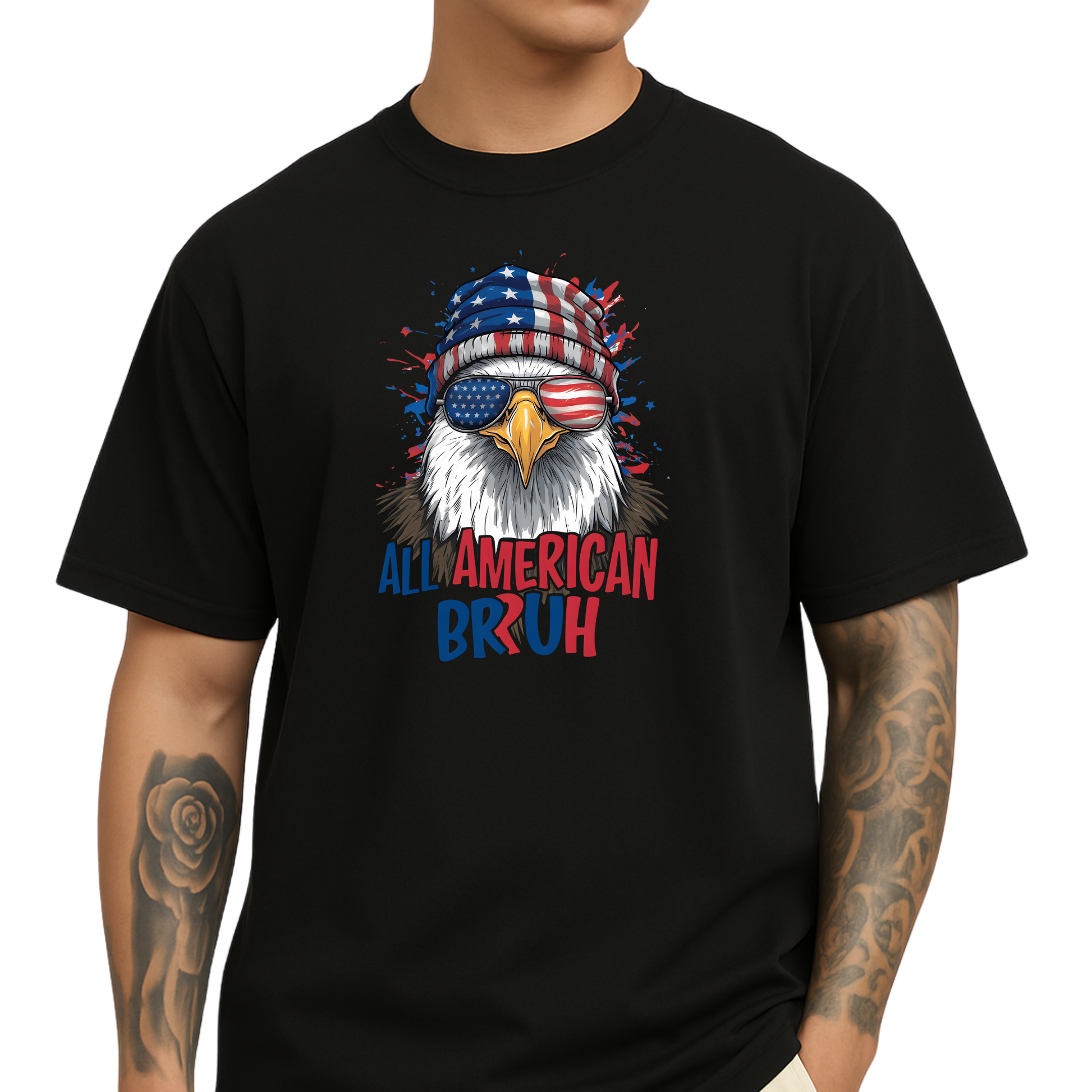 Man wearing black “All American Bruh” T-shirt featuring a bald eagle with American flag beanie and sunglasses. Patriotic 4th of July shirt with red, white, and blue design, perfect for Independence Day, Memorial Day, or veteran celebrations. Funny USA pride tee for men.