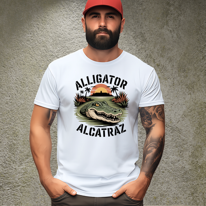 Muscular man with a beard wearing a white Donald Trumps Alligator Alcatraz T-shirt featuring a vintage alligator graphic and prison sunset design. Bold unisex tee styled for men. Great for outdoors, travel, and statement streetwear.