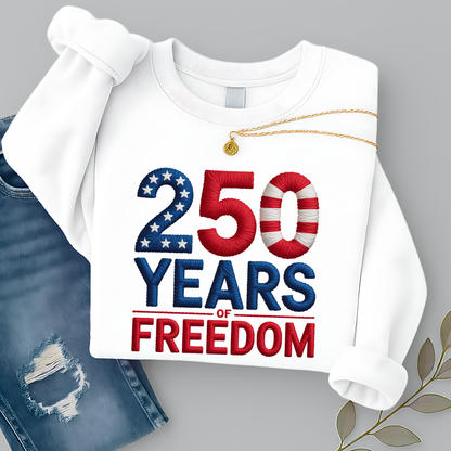 White sweatshirt with 250 Years of Freedom patriotic design folded with jeans