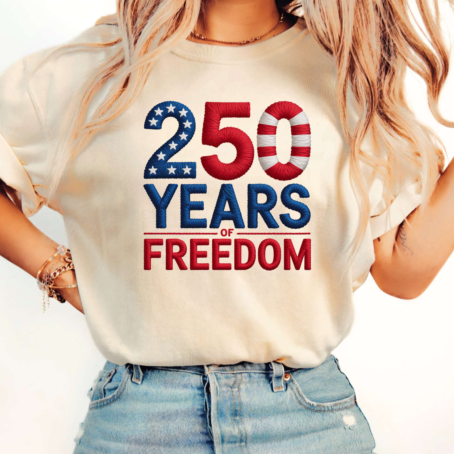 Beige Tshirt with 250 Years of Freedom patriotic design worn with jeans