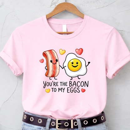 light pink valentines shirt with bacon and egg you’re the bacon to my eggs graphic