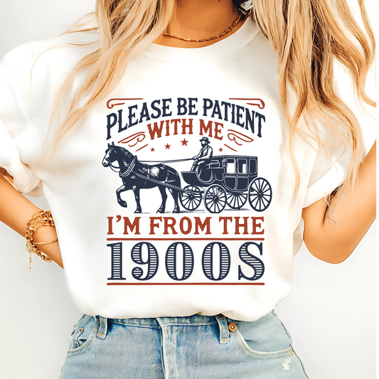 Model wearing white T-shirt with Please Be Patient With Me I’m From the 1900s horse and carriage design – funny nostalgic unisex cotton tee for men and women