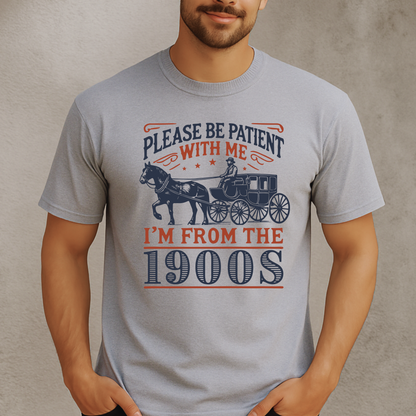 Male model wearing sports gray T-shirt with Please Be Patient With Me I’m From the 1900s horse carriage print – funny unisex retro cotton tee