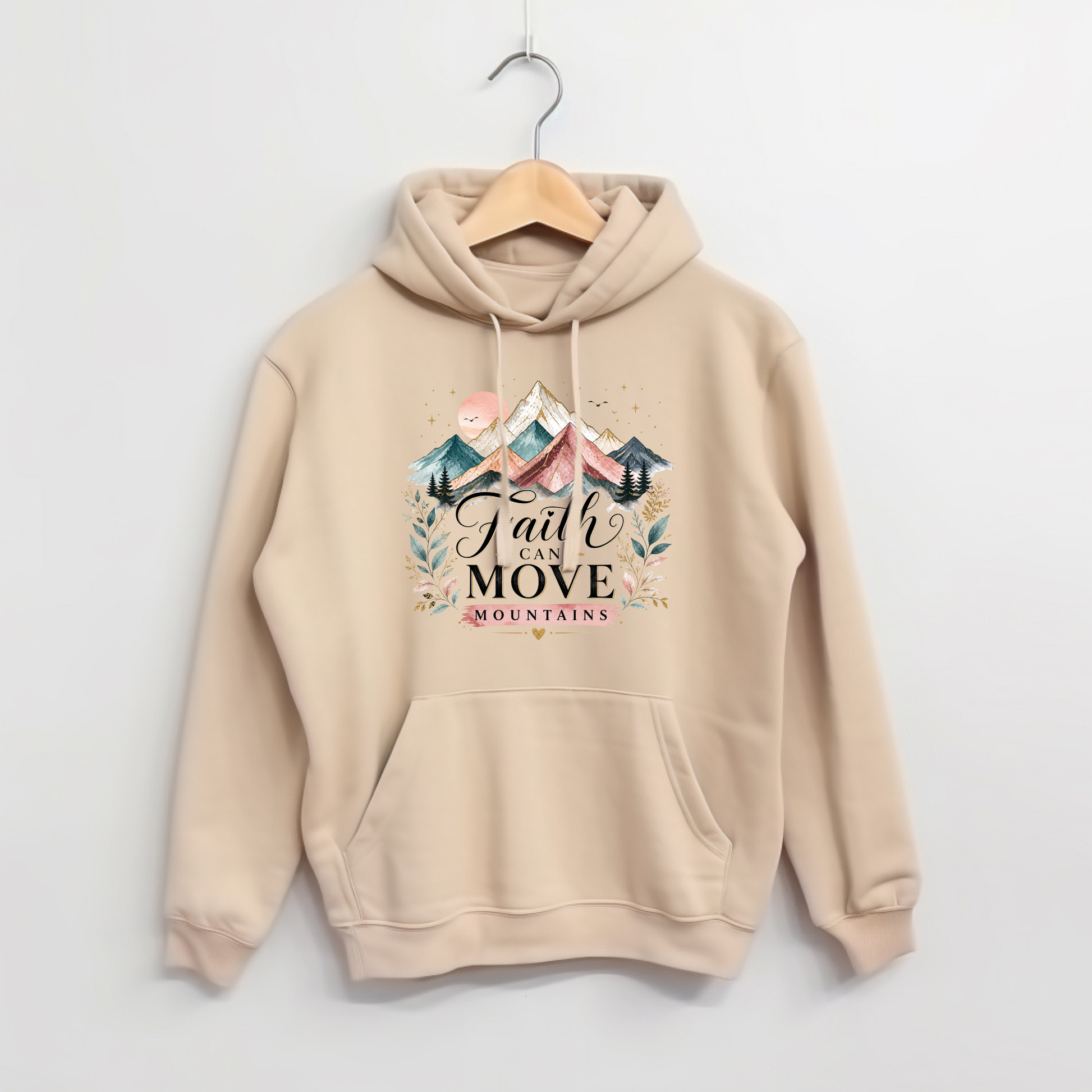 Beige hoodie with 'Faith Can Move Mountains' text and mountain design on a white background
