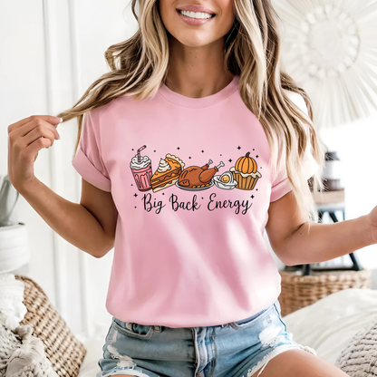 pink T-shirt with Big Back Energy design modeled indoors