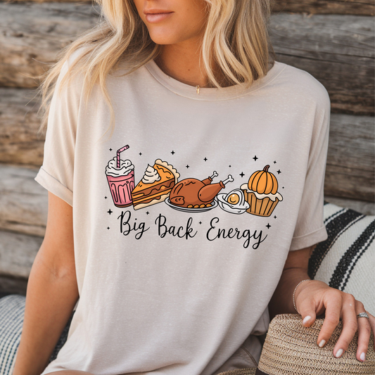 Sand T-shirt with Big Back Energy Thanksgiving design styled outdoors
