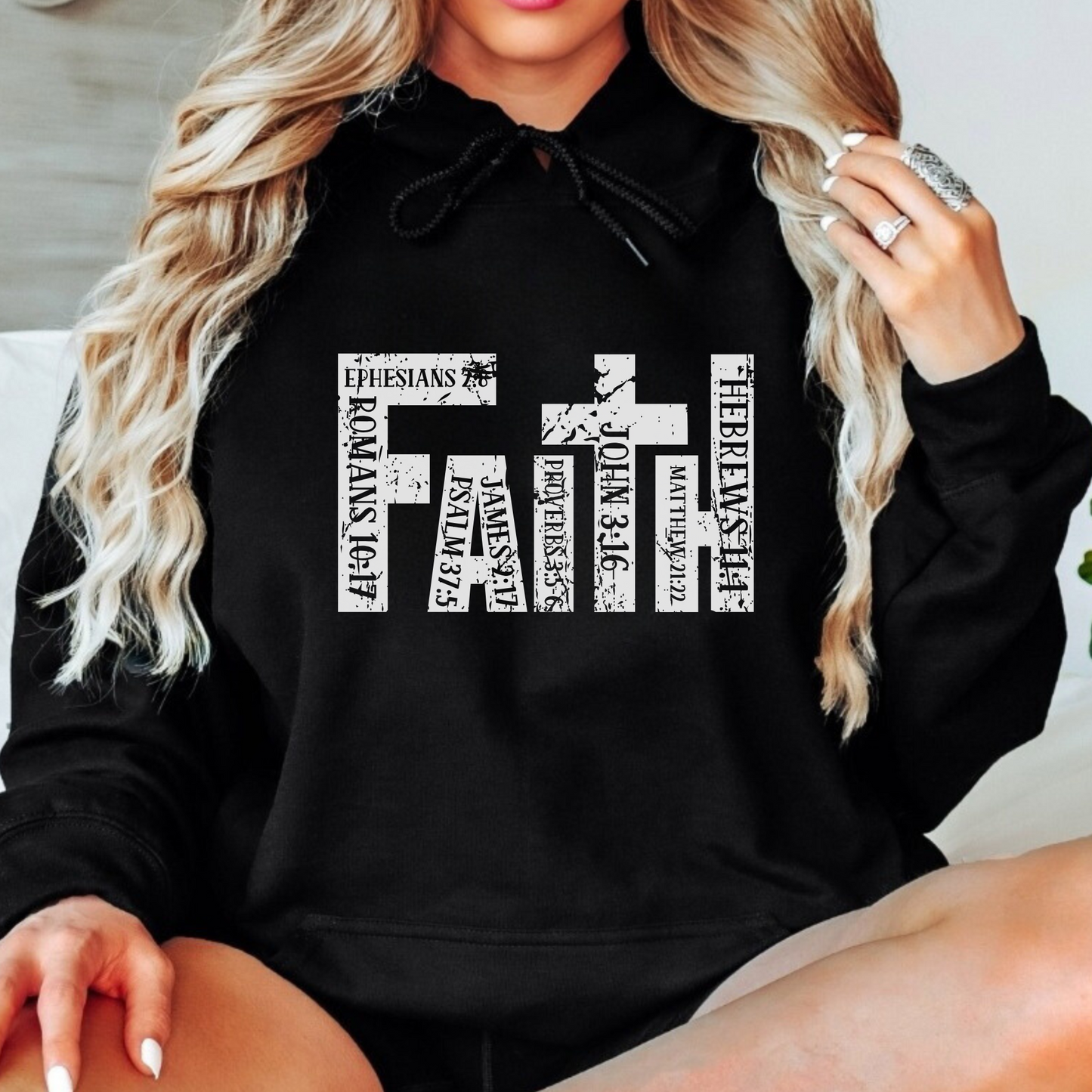 Woman wearing Black FAITH Hoodie – Premium Christian Apparel