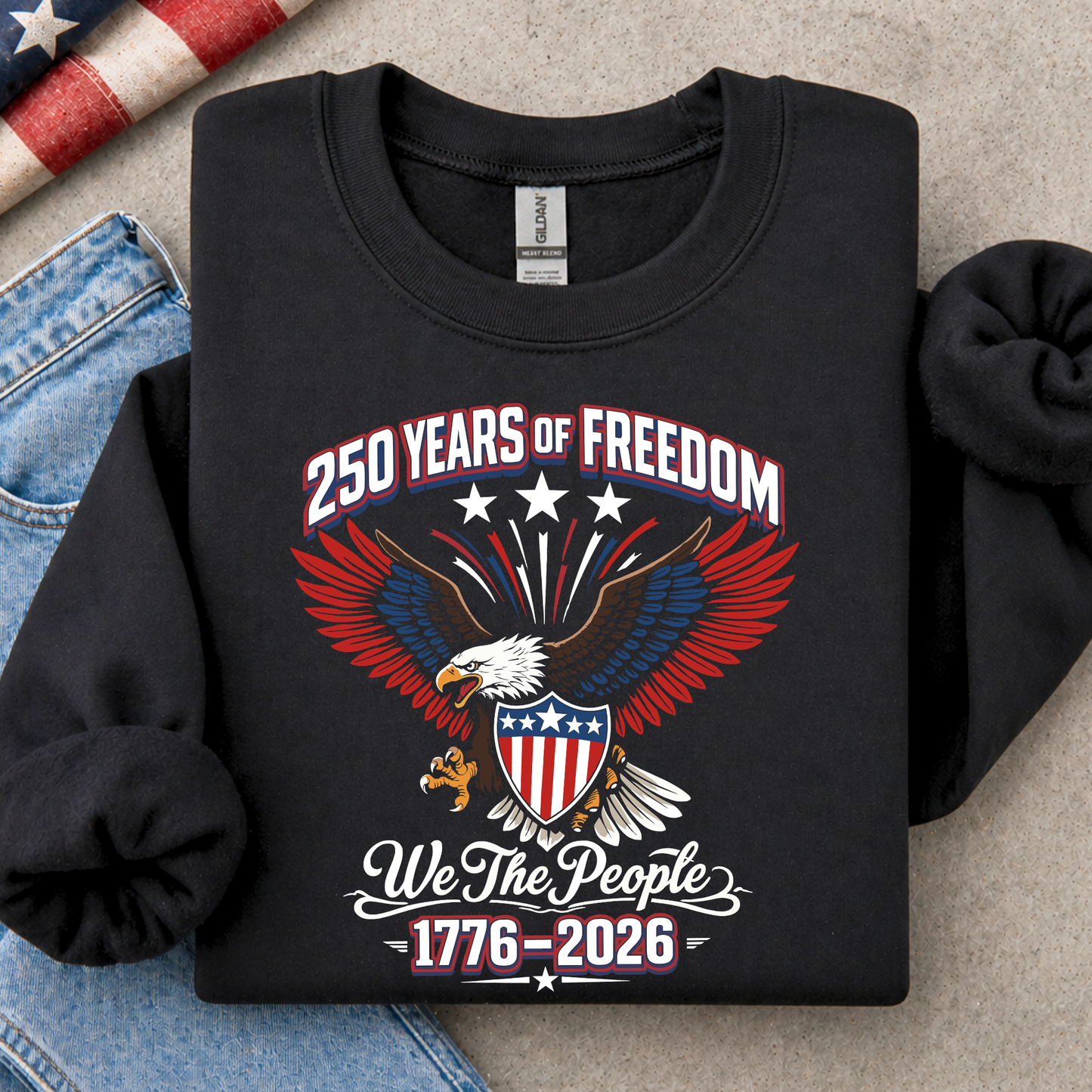 Black America sweatshirt with eagle design and text on a gray surface