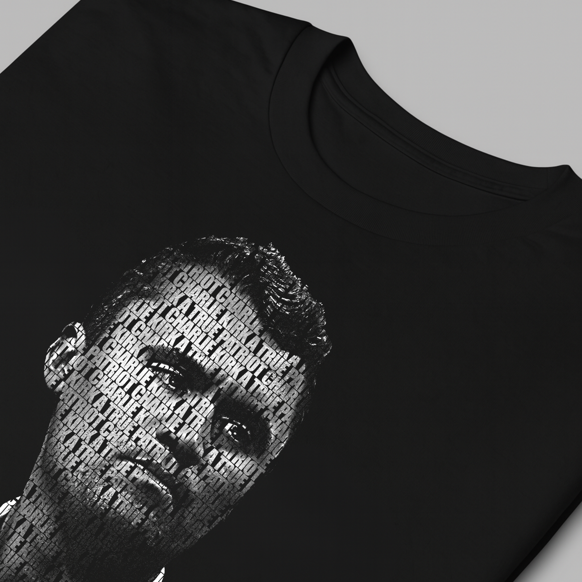 Charlie Kirk memorial women's t-shirt typography detail A True Patriot text design close-up