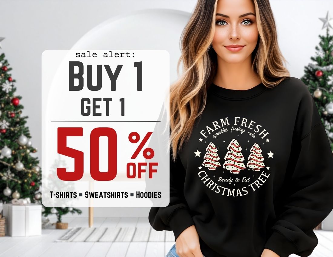 Sale Alert, Buy 1 Get 1  50% Off Woman wearing a black sweatshirt with Christmas tree design, surrounded by festive decorations.