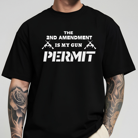 Black t-shirt with white 2nd Amendment gun rights permit graphic worn by tattooed man
