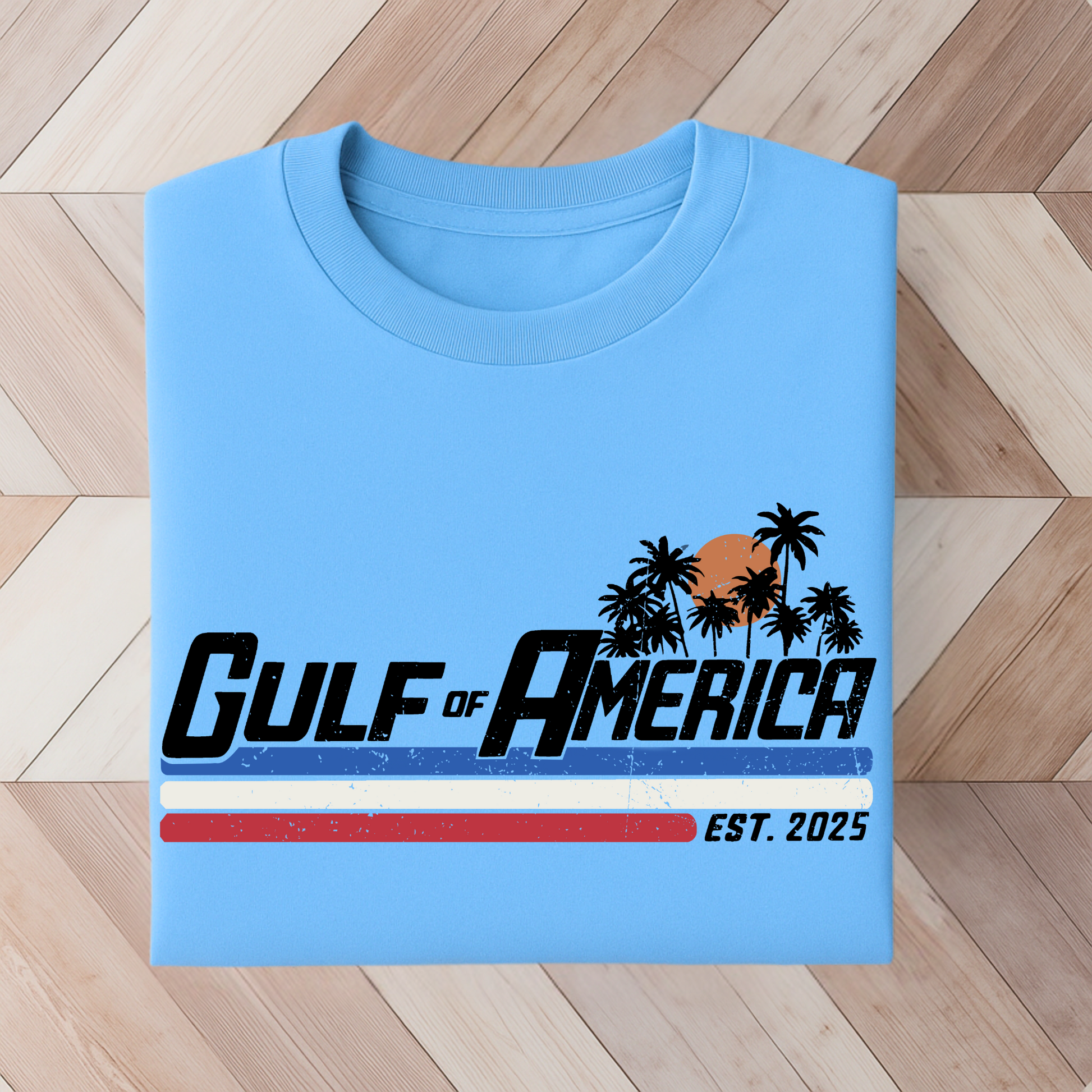 Blue colored patriotic T-shirt with palm tree sunset graphic