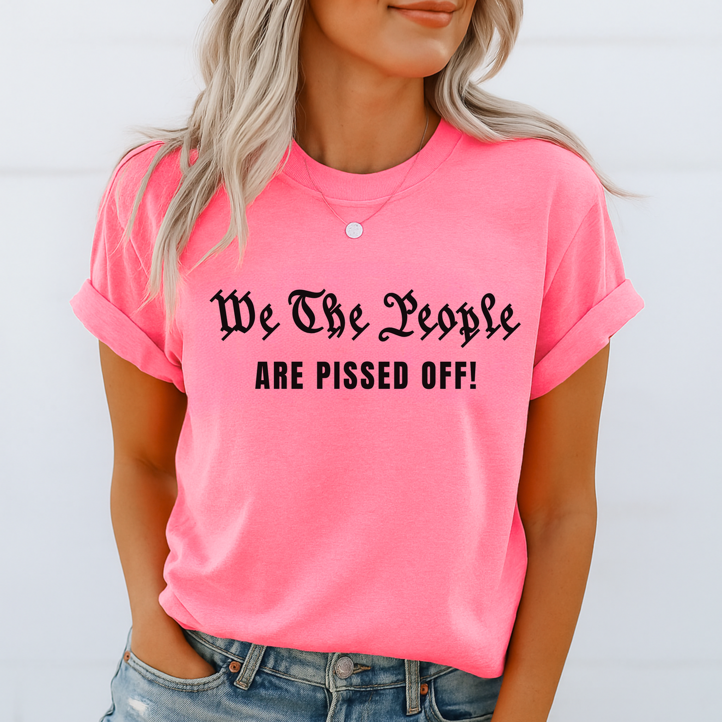Bold women’s black tee with We The People Are Pissed Off design