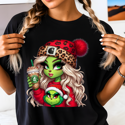 Black Christmas graphic T-shirt with Boujee Green Girl holiday design, worn by teen girl. Trendy holiday tee for casual winter outfits.