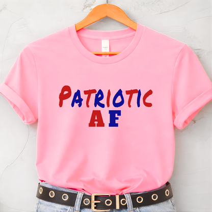 Pink patriotic AF graphic t-shirt hanging on hanger flat lay