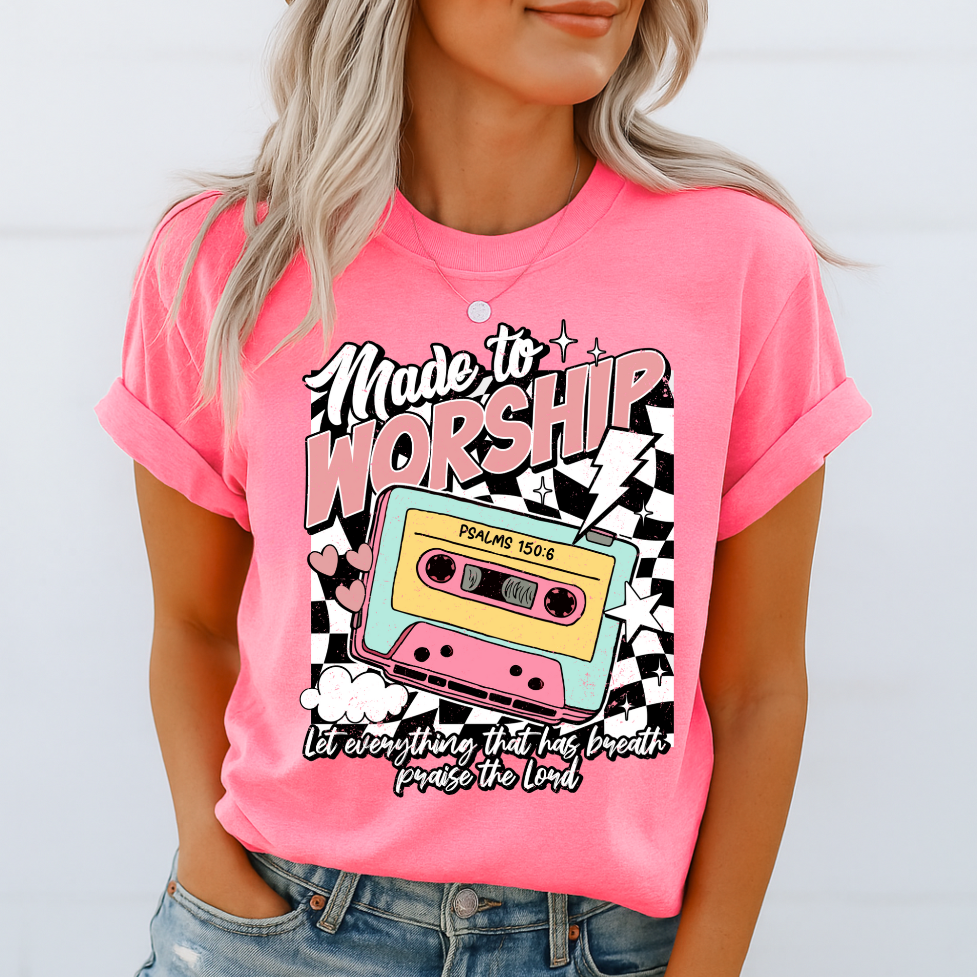 Bright pink retro cassette graphic tee with bold lettering