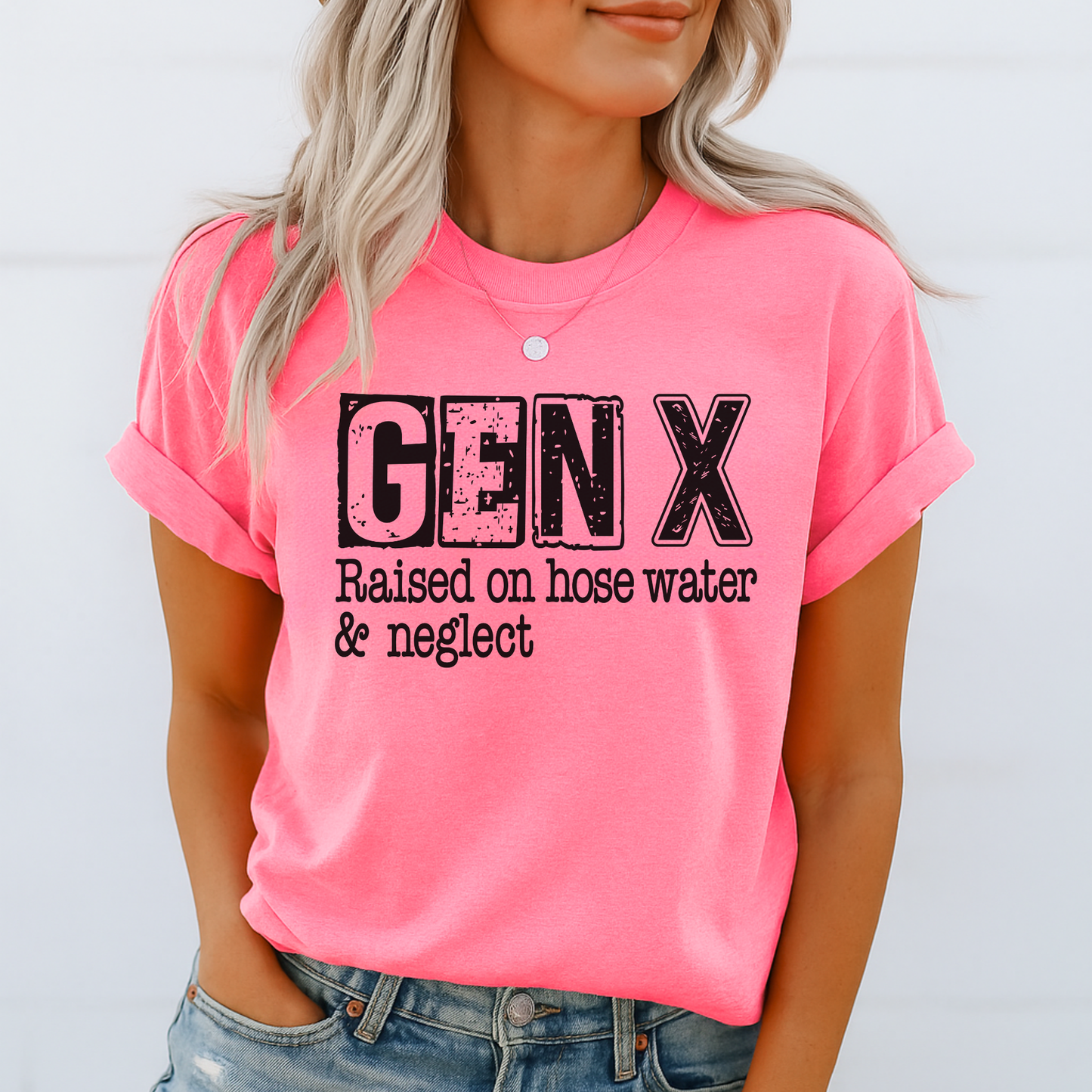 Bright pink rolled-sleeve tee with Gen X sarcastic quote graphic