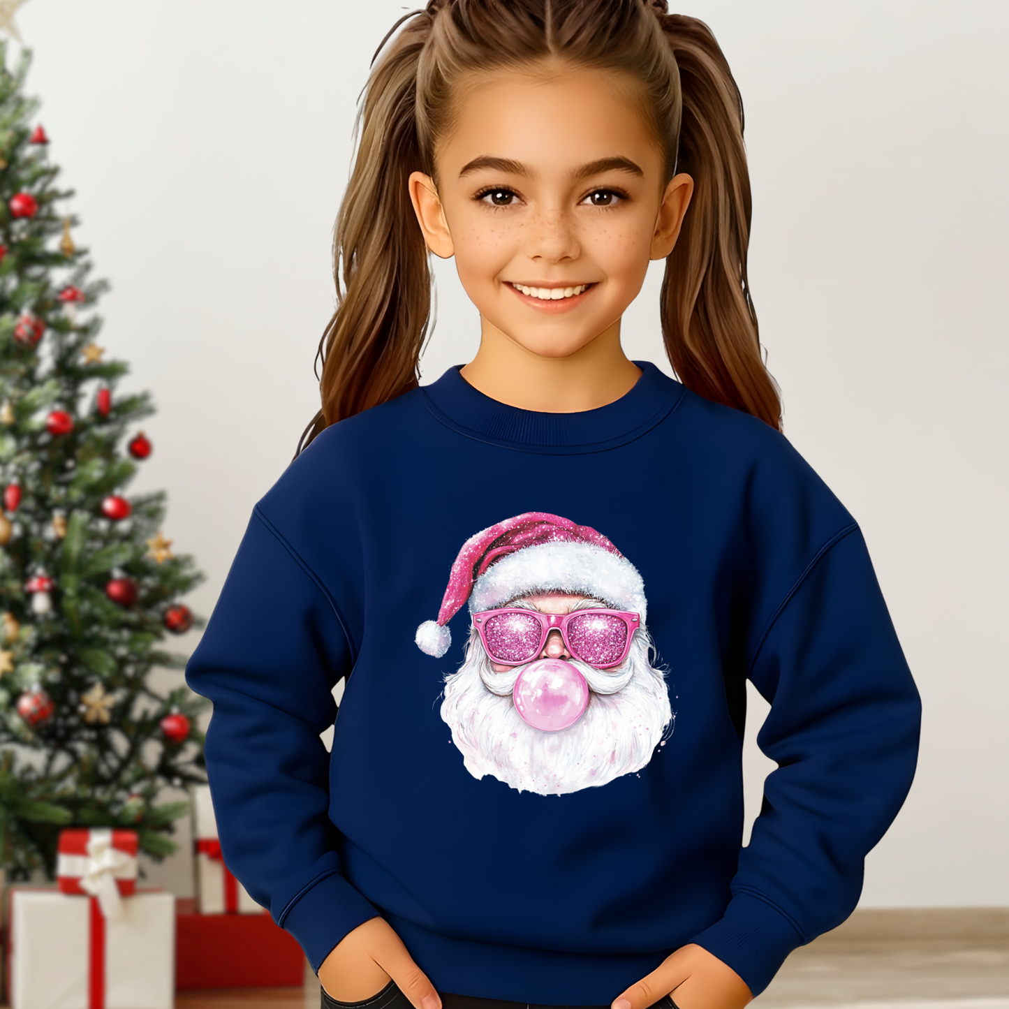 Youth girl wearing navy sweatshirt with pink bubblegum Santa graphic