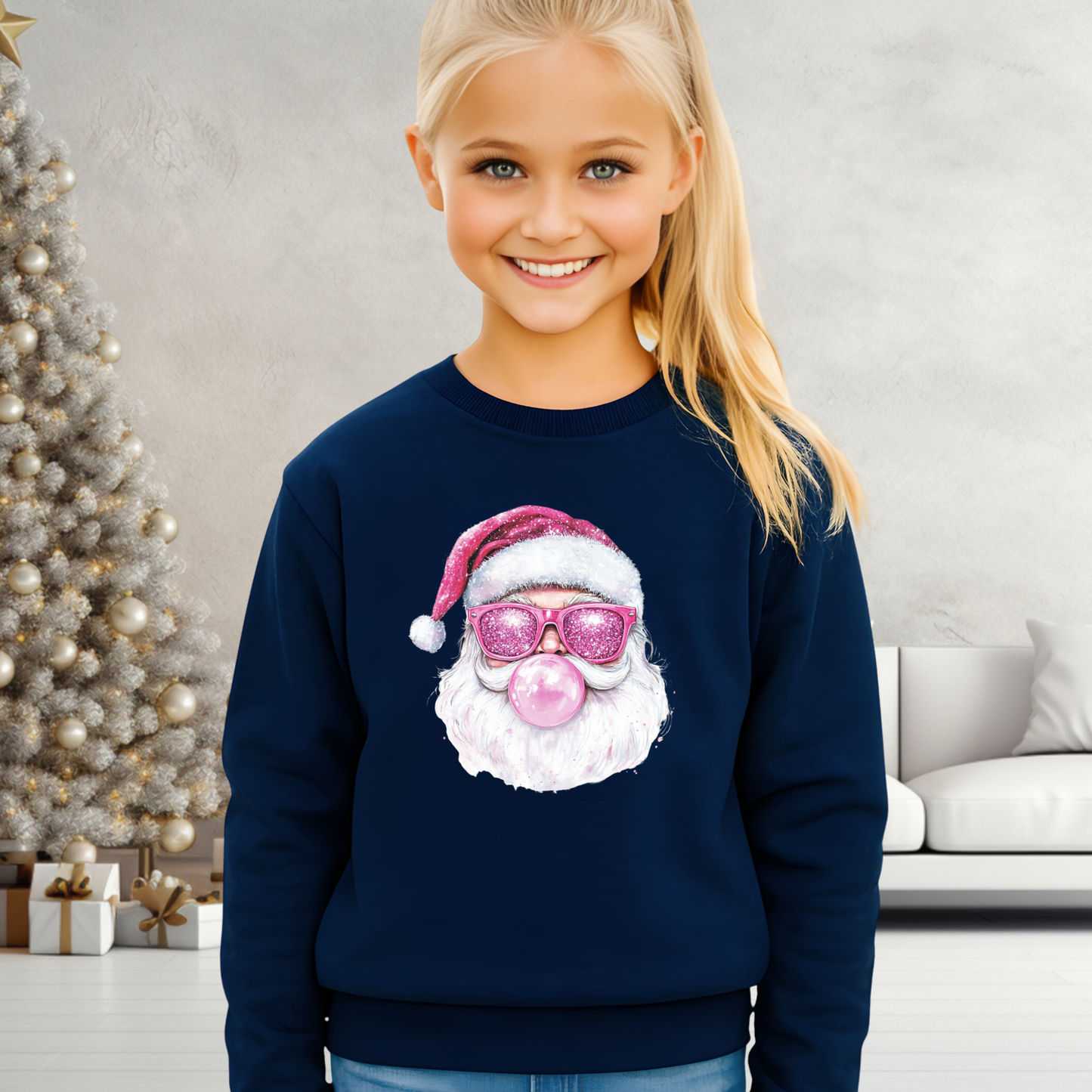 Youth girl wearing navy holiday sweatshirt with pink bubblegum Santa design